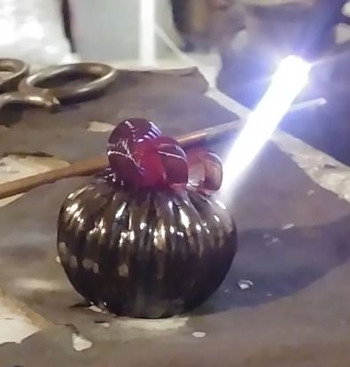 glass pumpkin being made